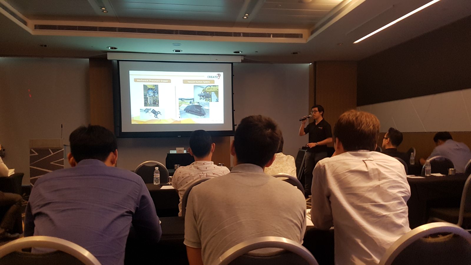 Mr. Cheong Zhi Sheng of Creatz3D presenting on the synergy between 3D printing and end-of-arm-tooling