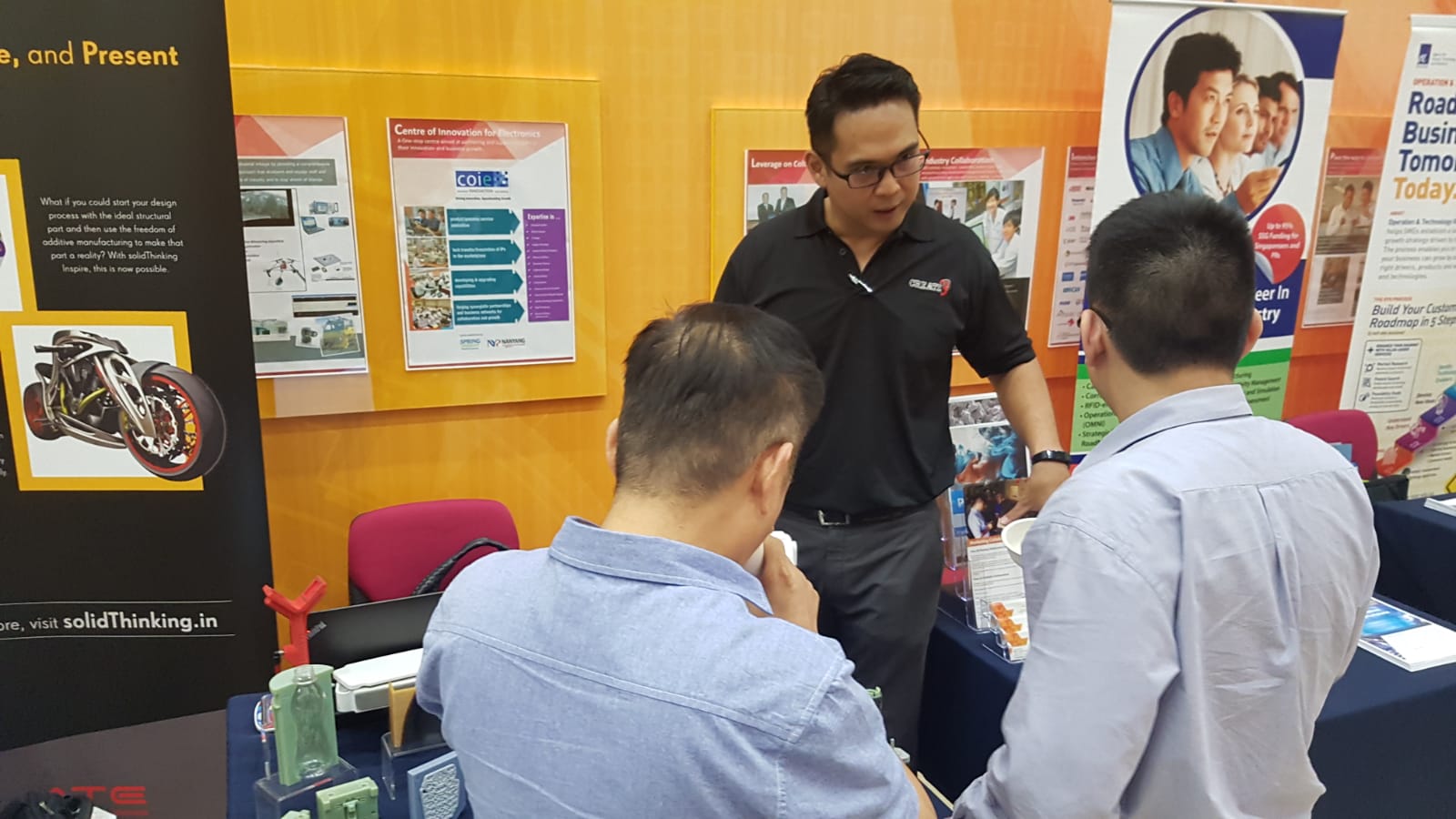 Sales Engineer Eddie Gan explaining the benefits of 3D printing Sales Engineer Eddie Gan explaining the benefits of 3D printing