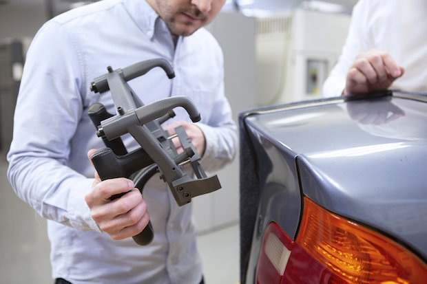 BMW has replaced aluminum fixtures with FDM 3D printed ABS thermoplastic fixtures.