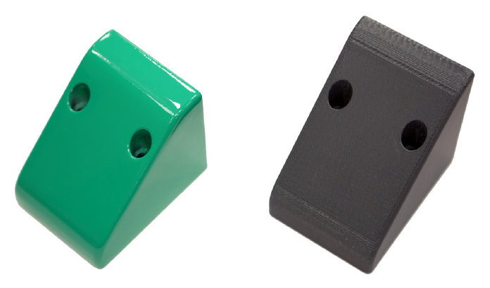 Strong, yet lightweight 3D printed protective casing used on robotic packaging machines. Produced with the Stratasys Fortus 450mc in FDM Nylon 12CF material and finished with green varnish.