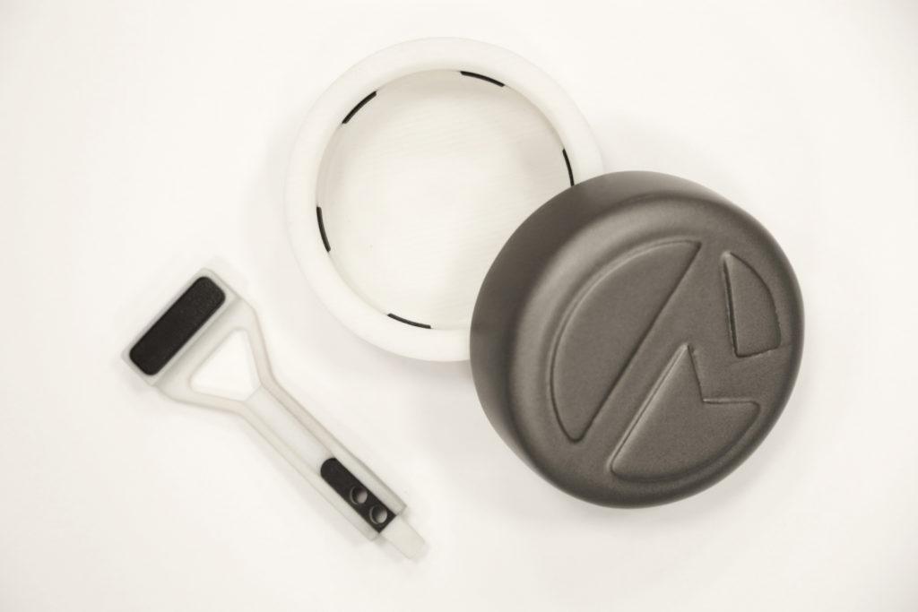 Grasping pincer and packaging lid 3D printed using Stratasys PolyJet 3D printer.